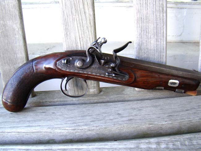 An exceptionally fine gentleman's flintlock travelling pistol by Clough & Sons, Bath, England, circa 1820.